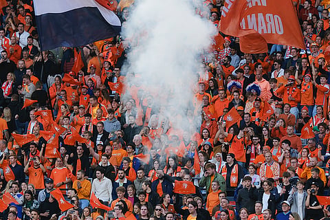Orange-clad fans